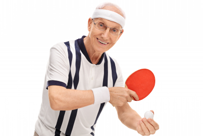 active senior playing ping-pong